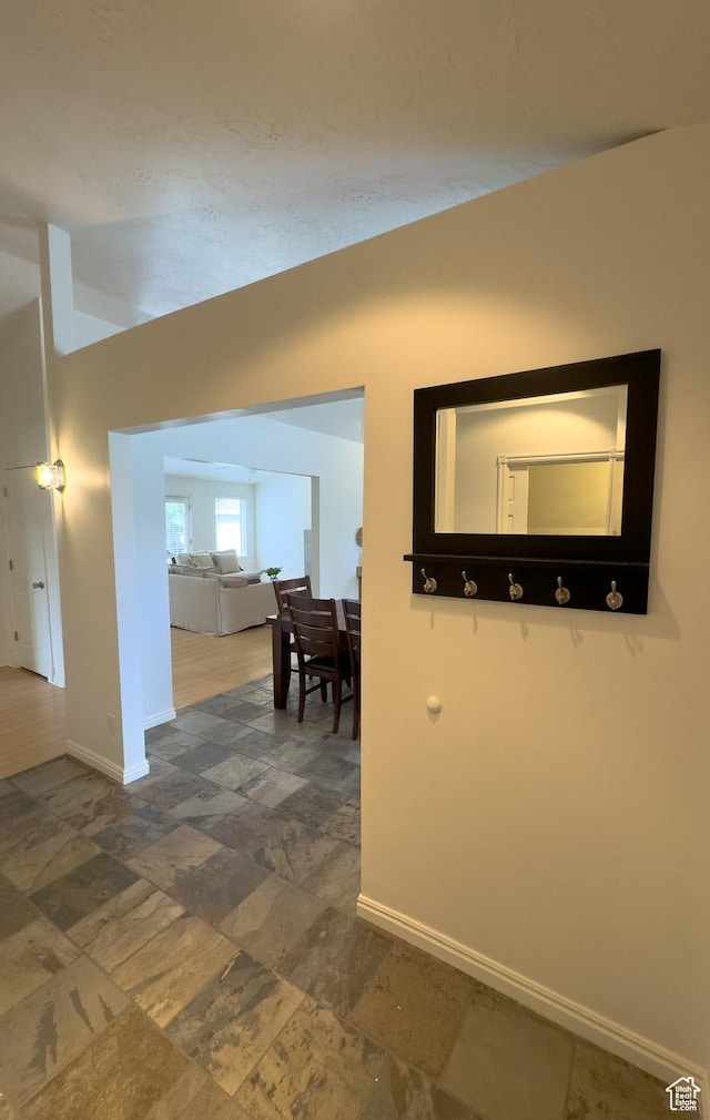 841 E 8600 S, Sandy, UT 84094 - corridor featuring vaulted ceiling and stone finish flooring
