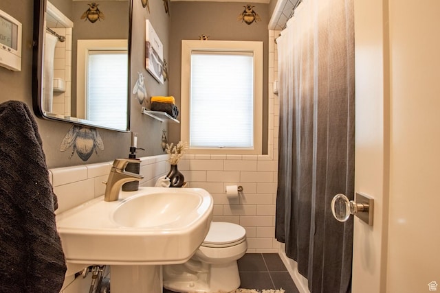 1127 S Denver St S, Salt Lake City, UT 84111 - full bathroom featuring tile patterned floors and tile walls