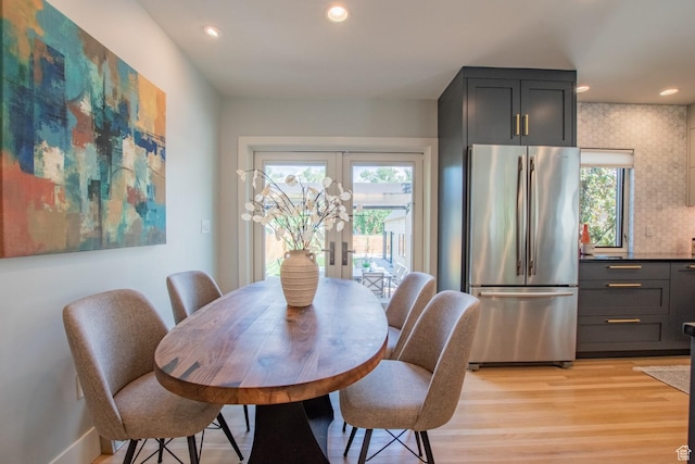 1127 S Denver St S, Salt Lake City, UT 84111 - dining room with healthy amount of natural light, french doors, light wood-style floors, and recessed lighting