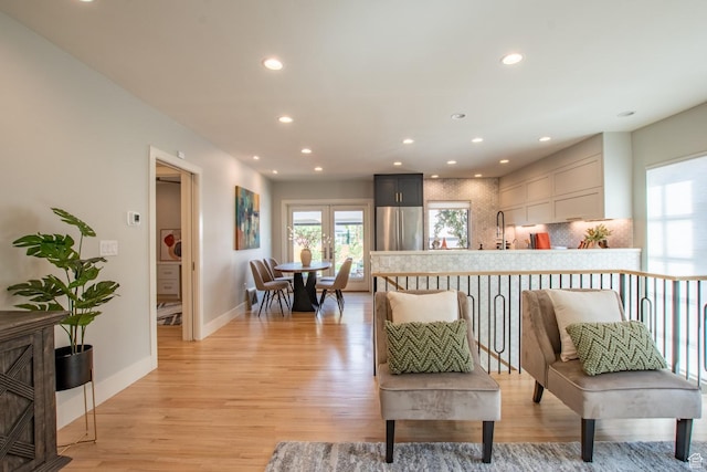 1127 S Denver St S, Salt Lake City, UT 84111 - living area featuring light wood-style floors and recessed lighting