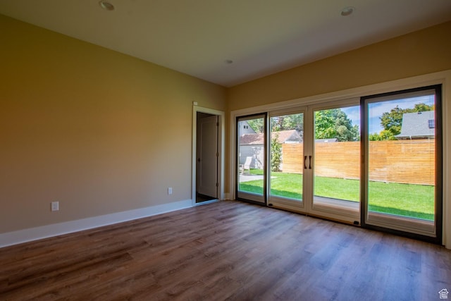 1127 S Denver St S, Salt Lake City, UT 84111 - unfurnished room featuring wood finished floors and baseboards