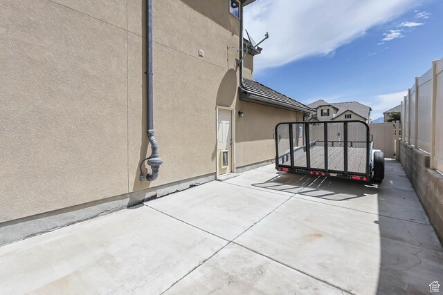 14346 S Fort Duchesne Cv, Herriman, UT 84096 - view of patio with a gate