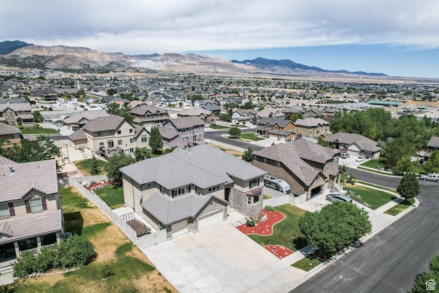 14346 S Fort Duchesne Cv, Herriman, UT 84096 - aerial perspective of suburban area with a mountain backdrop