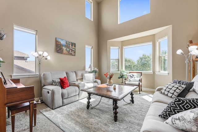 14346 S Fort Duchesne Cv, Herriman, UT 84096 - living room with carpet floors and a towering ceiling