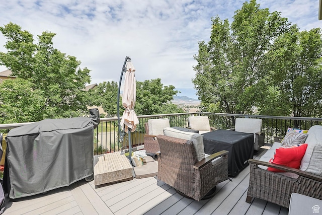 14346 S Fort Duchesne Cv, Herriman, UT 84096 - deck featuring an outdoor hangout area, a mountain view, and area for grilling