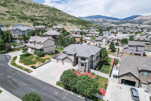 14346 S Fort Duchesne Cv, Herriman, UT 84096 - aerial perspective of suburban area featuring a mountain backdrop