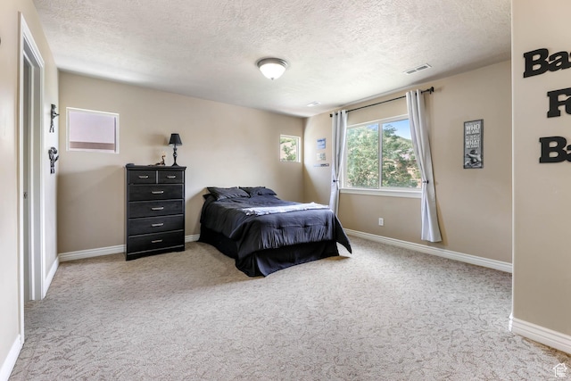 14346 S Fort Duchesne Cv, Herriman, UT 84096 - bedroom featuring carpet flooring and a textured ceiling