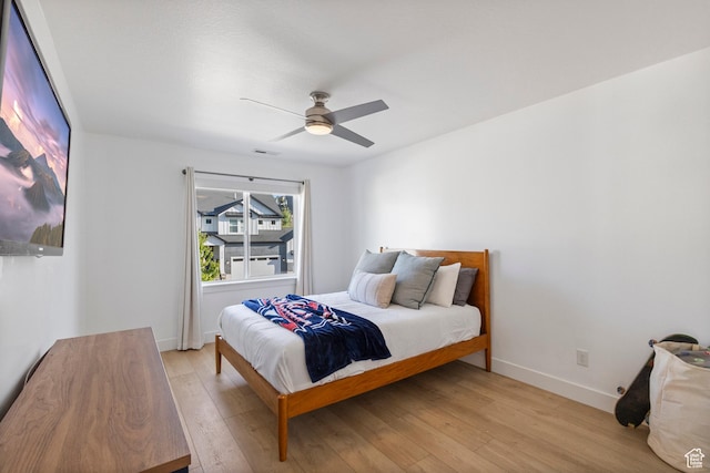 2437 E Ember Dr, Draper, UT 84020 - bedroom featuring light wood-style flooring and a ceiling fan