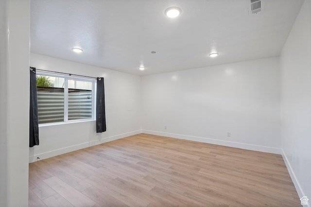 2437 E Ember Dr, Draper, UT 84020 - spare room with light wood-type flooring and baseboards