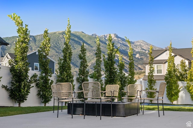 2437 E Ember Dr, Draper, UT 84020 - view of property's community with a mountain view and a patio area