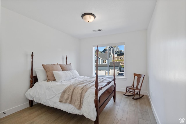 2437 E Ember Dr, Draper, UT 84020 - bedroom featuring light wood-type flooring and baseboards