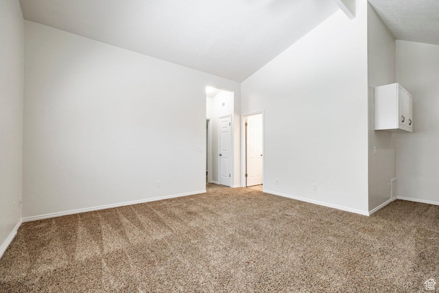 1241 N 575 W, Centerville, UT 84014 - spare room with light colored carpet and vaulted ceiling