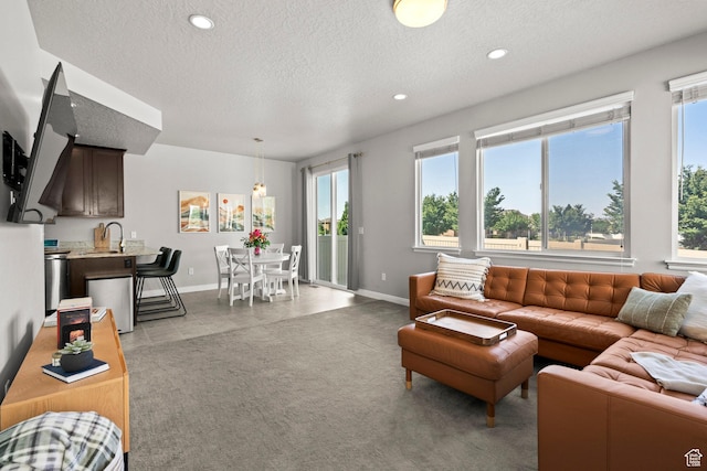 3733 N Prairie Grass Dr W, Lehi, UT 84043 - living area with a textured ceiling and recessed lighting