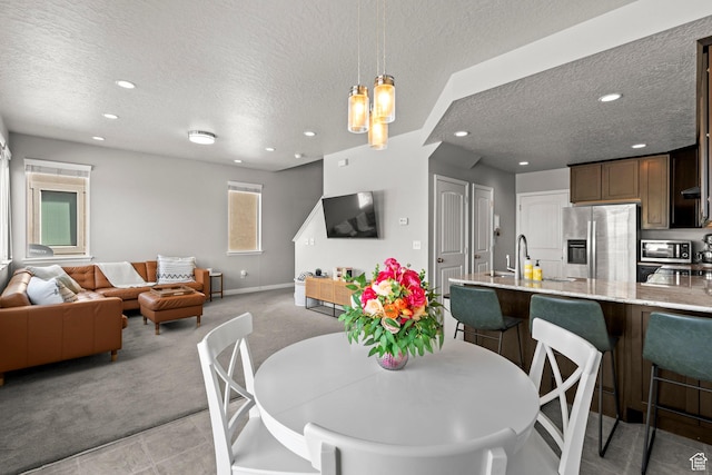 3733 N Prairie Grass Dr W, Lehi, UT 84043 - dining room featuring a textured ceiling, light colored carpet, and recessed lighting