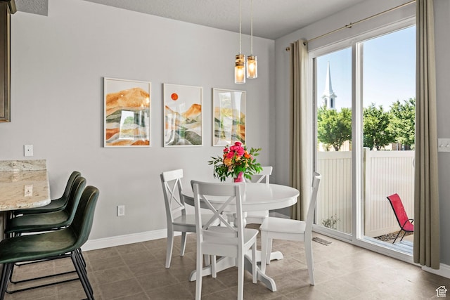 3733 N Prairie Grass Dr W, Lehi, UT 84043 - dining area with a chandelier and baseboards