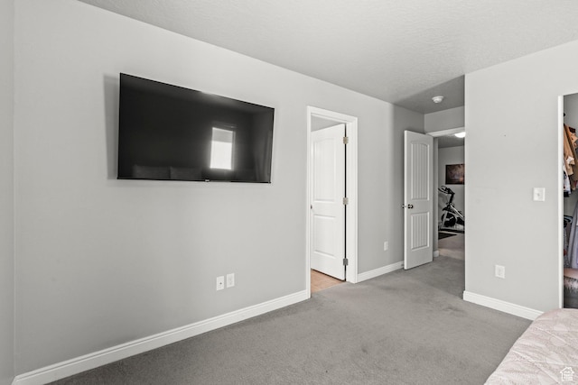 3733 N Prairie Grass Dr W, Lehi, UT 84043 - unfurnished bedroom featuring carpet and a spacious closet