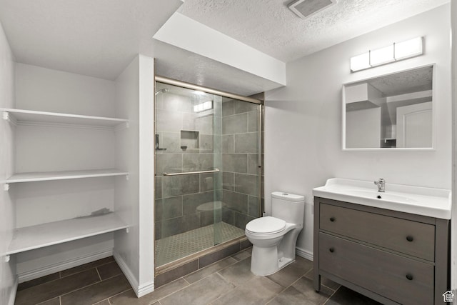3733 N Prairie Grass Dr W, Lehi, UT 84043 - bathroom featuring vanity, a stall shower, a textured ceiling, and tile patterned flooring