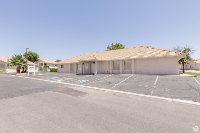 504 E Telegraph Unit 39, Washington, UT 84780 - ranch-style house featuring uncovered parking, a tile roof, and stucco siding