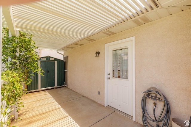 504 E Telegraph Unit 39, Washington, UT 84780 - wooden terrace featuring a storage shed