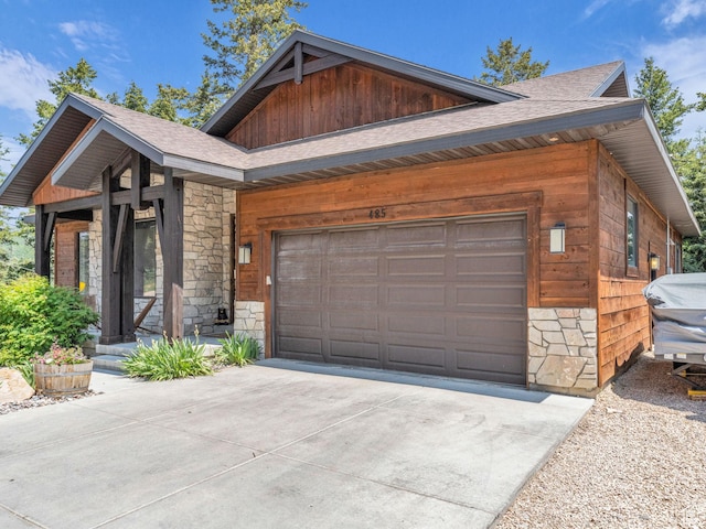 485 Parkview Dr, Summit Park, UT 84098 - contemporary house featuring stone siding, driveway, a garage, and a shingled roof