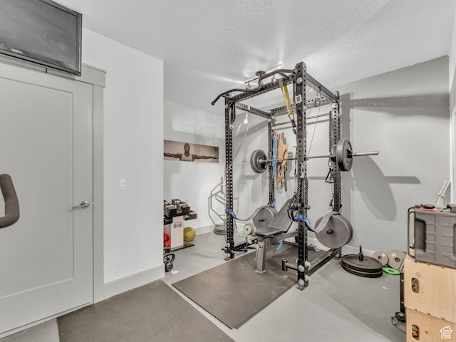 485 Parkview Dr, Summit Park, UT 84098 - exercise room with baseboards and a textured ceiling