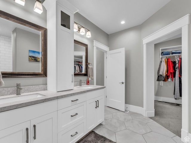 485 Parkview Dr, Summit Park, UT 84098 - full bath with double vanity, a spacious closet, recessed lighting, and tile patterned flooring