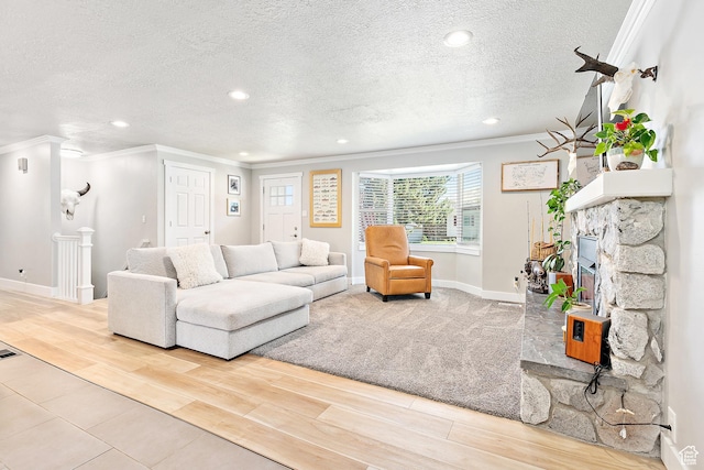 520 990 N, Pleasant Grove, UT 84062 - living area with ornamental molding, a textured ceiling, recessed lighting, wood finished floors, and a fireplace