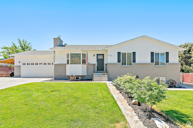 520 990 N, Pleasant Grove, UT 84062 - ranch-style house with a chimney, a garage, a front yard, and driveway