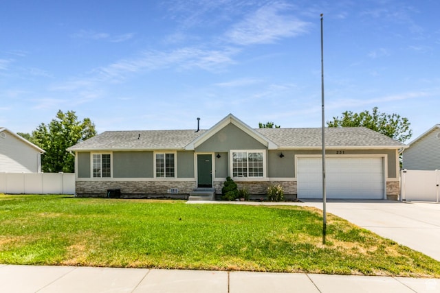 231 Amanda Lynn Ln, Midvale, UT 84047 - single story home with stone siding, stucco siding, an attached garage, and concrete driveway