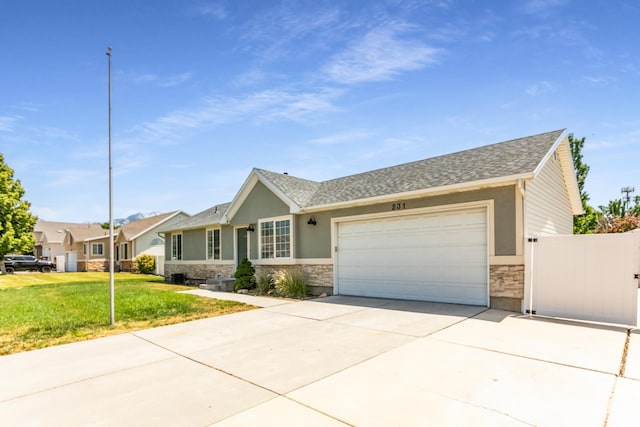 231 Amanda Lynn Ln, Midvale, UT 84047 - single story home featuring driveway, a garage, a front lawn, stone siding, and roof with shingles
