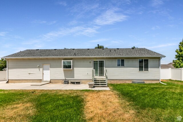 231 Amanda Lynn Ln, Midvale, UT 84047 - back of property with a patio