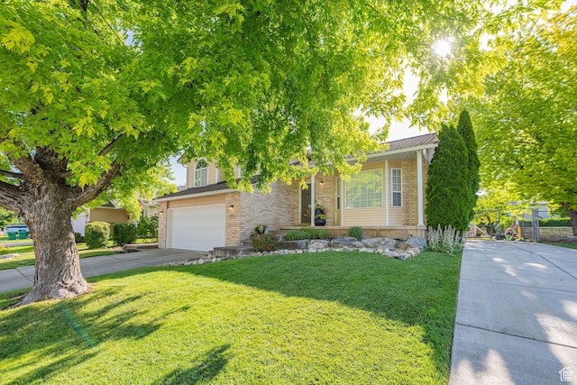 4922 S 2925 W, Roy, UT 84067 - view of property hidden behind natural elements featuring brick siding, driveway, a front yard, and an attached garage
