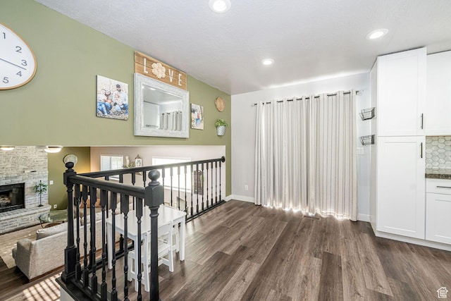 4922 S 2925 W, Roy, UT 84067 - corridor featuring dark wood-type flooring, recessed lighting, and a textured ceiling