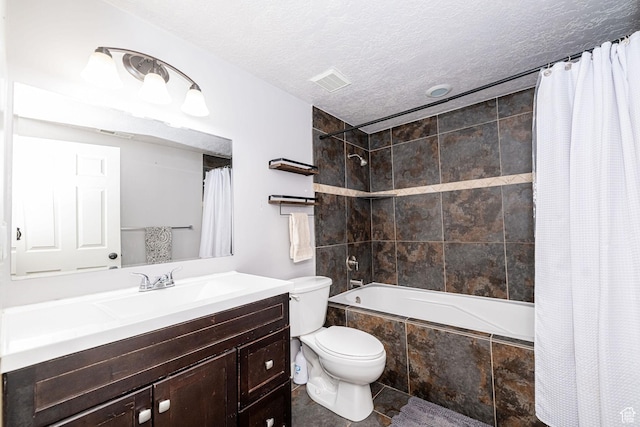 4922 S 2925 W, Roy, UT 84067 - bathroom featuring tiled shower / bath combo, vanity, a textured ceiling, and tile patterned floors