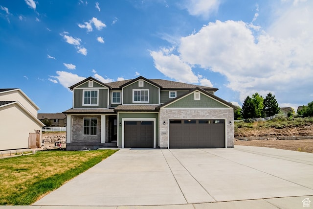 7169 W Moorepark Pl, West Jordan, UT 84081 - craftsman-style house with driveway, an attached garage, and stone siding
