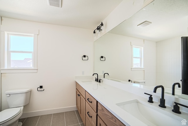 7169 W Moorepark Pl, West Jordan, UT 84081 - bathroom featuring toilet and double vanity
