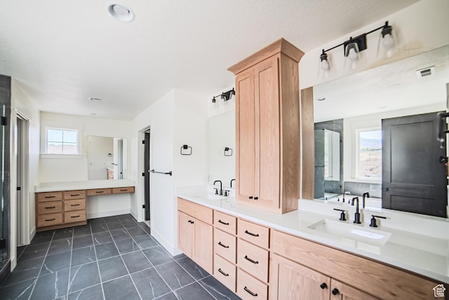 7169 W Moorepark Pl, West Jordan, UT 84081 - bathroom with double vanity and tile patterned flooring