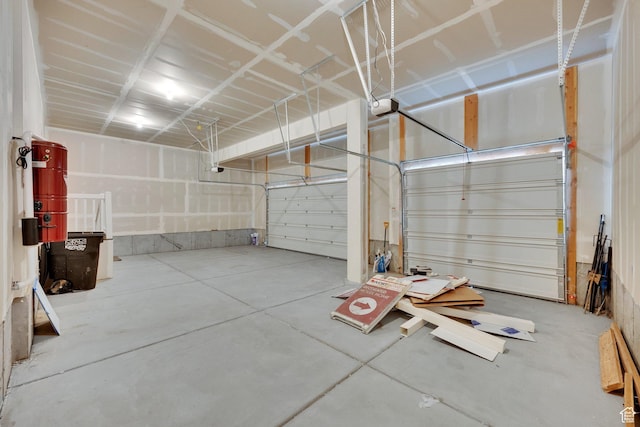 1378 E Orchard Ridge Ln, Kaysville, UT 84037 - garage featuring a garage door opener and a central vacuum unit