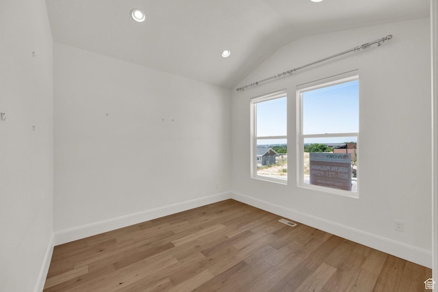1378 E Orchard Ridge Ln, Kaysville, UT 84037 - empty room featuring vaulted ceiling, light wood-style flooring, and recessed lighting