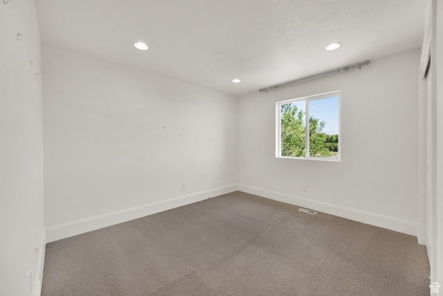 1378 E Orchard Ridge Ln, Kaysville, UT 84037 - empty room with dark carpet and recessed lighting