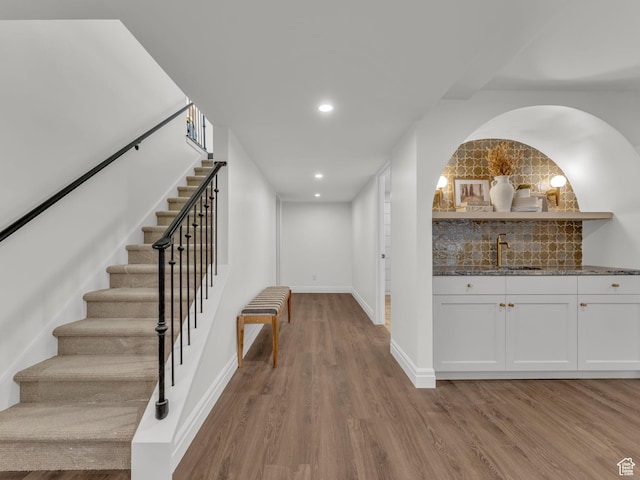 1499 E River Oaks Dr, Sandy, UT 84093 - hallway featuring wood finished floors, stairs, and recessed lighting