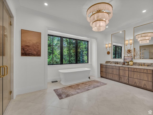 1499 E River Oaks Dr, Sandy, UT 84093 - bathroom with double vanity, a freestanding tub, a shower stall, recessed lighting, and a chandelier