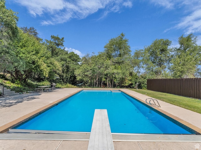 1499 E River Oaks Dr, Sandy, UT 84093 - view of swimming pool featuring a patio area, a diving board, and view of scattered trees