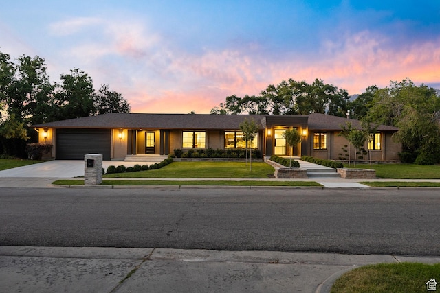 1499 E River Oaks Dr, Sandy, UT 84093 - view of front of property featuring driveway, a garage, and a front yard