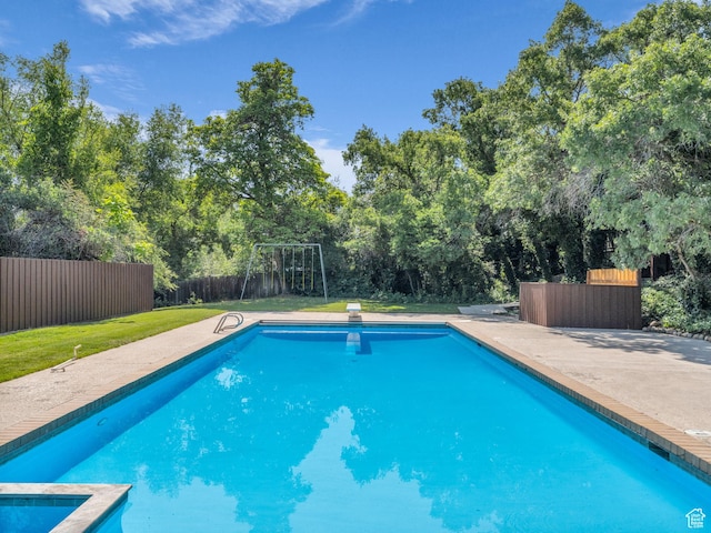 1499 E River Oaks Dr, Sandy, UT 84093 - view of swimming pool with a fenced backyard and a diving board