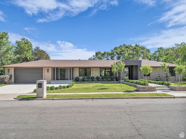 1499 E River Oaks Dr, Sandy, UT 84093 - view of front facade featuring concrete driveway, an attached garage, a front yard, and brick siding