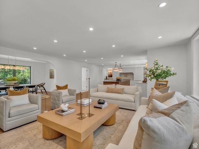 1499 E River Oaks Dr, Sandy, UT 84093 - living area with arched walkways and recessed lighting