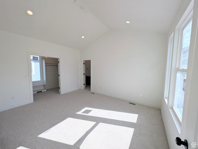 7083 W Granbury Dr S Unit 256, South Jordan, UT 84009 - unfurnished bedroom featuring lofted ceiling, light carpet, and recessed lighting