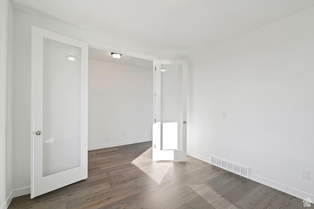 6941 W Farnsworth Peak Dr S Unit 316, West Jordan, UT 84081 - empty room featuring wood finished floors and french doors