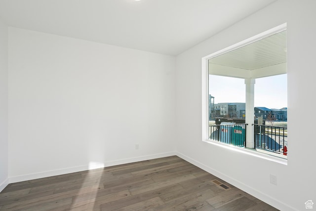 6941 W Farnsworth Peak Dr S Unit 316, West Jordan, UT 84081 - empty room with wood finished floors and baseboards